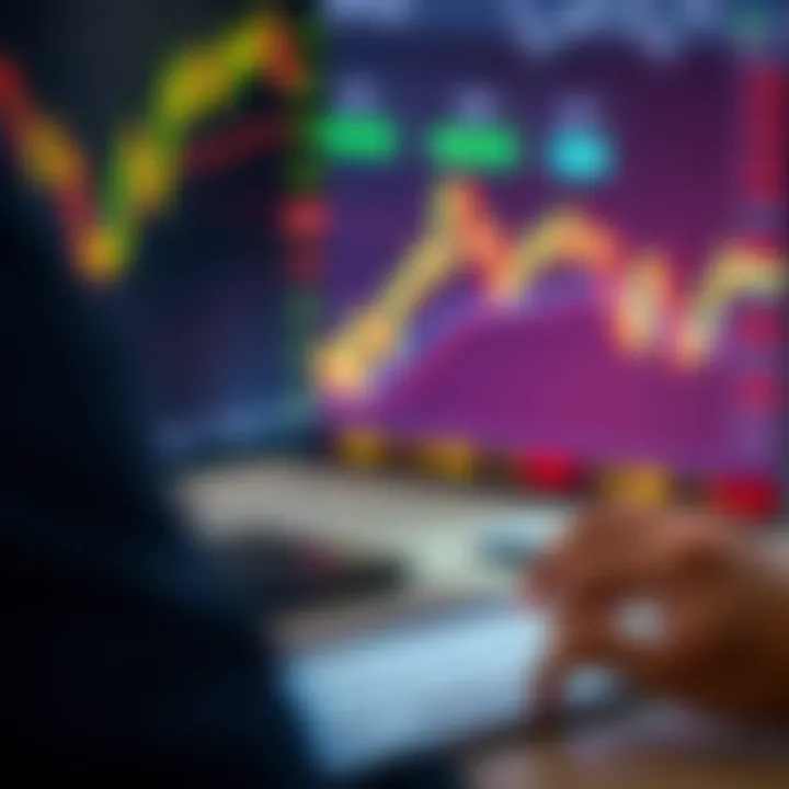 Hand using computer with Forex trading platform showing currency pairs and market data